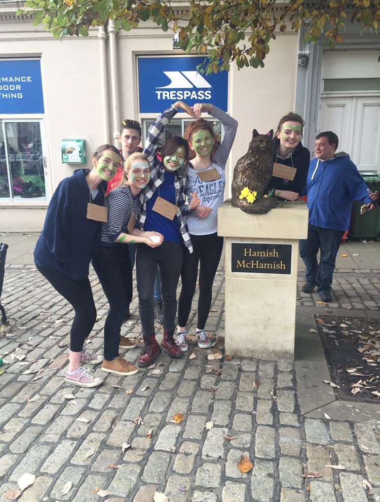 Raisin scavenger hunt with Hamish the cat, handfuls of sugar, and green faces, because why not?