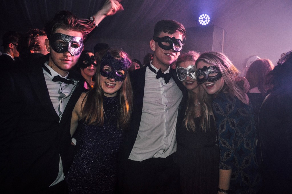Some of the masked revellers