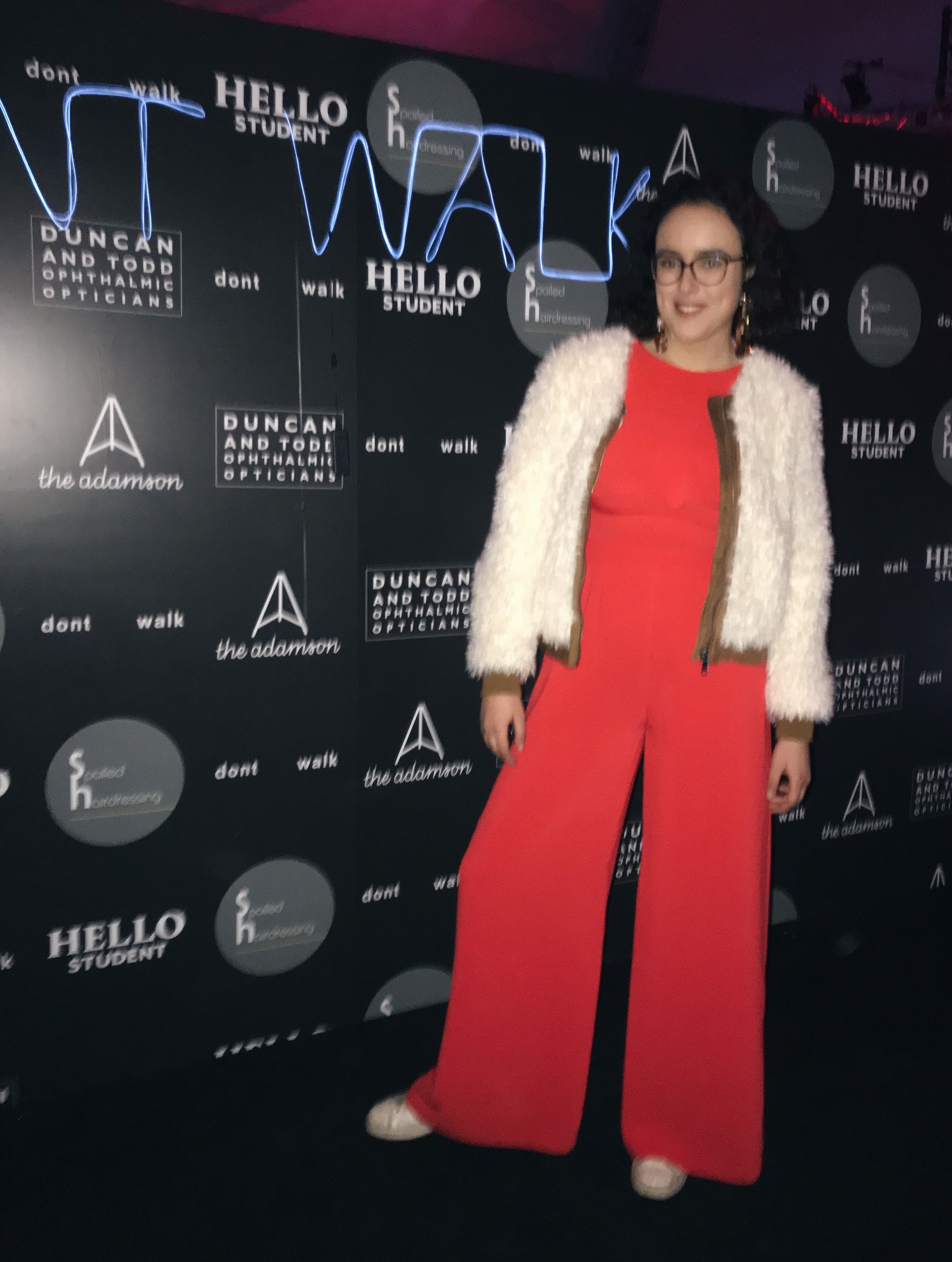 Image may contain: Sweater, Clothing, Cardigan, Red Carpet Premiere, Red Carpet, Premiere, Person, People, Human