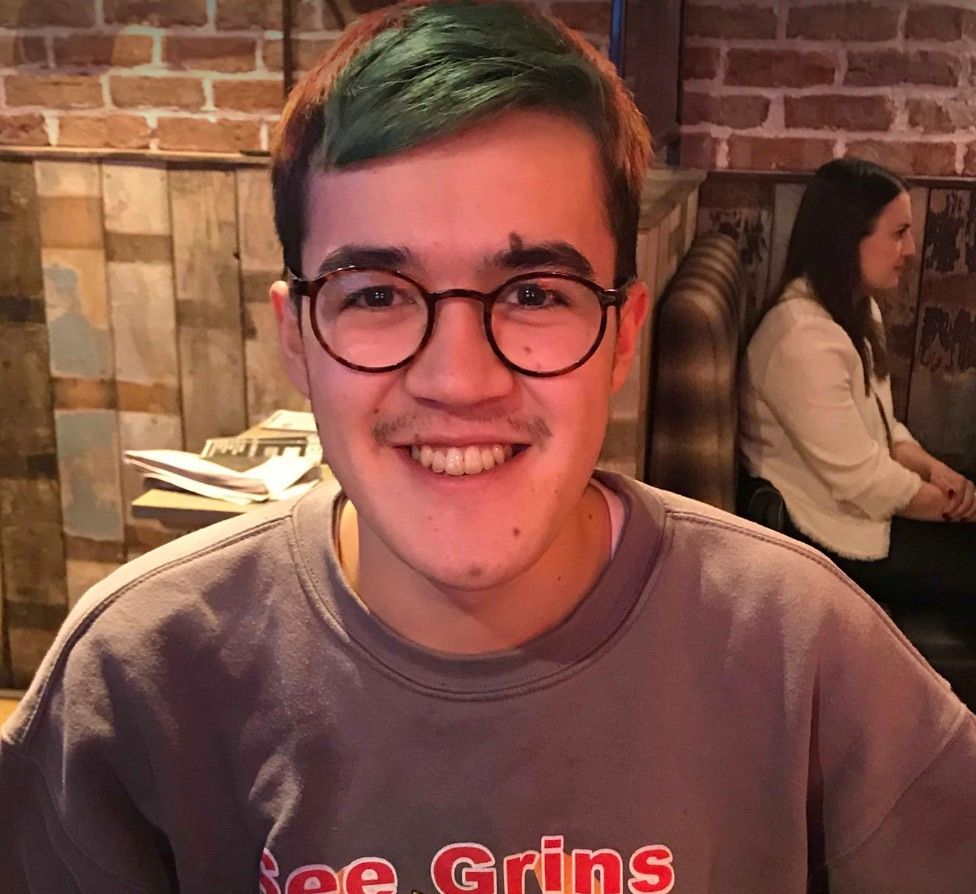 Image may contain: Selfie, Photography, Photo, Portrait, Man, Brick, Smile, Clothing, Apparel, Face, Human, Person, Accessory, Accessories, Glasses