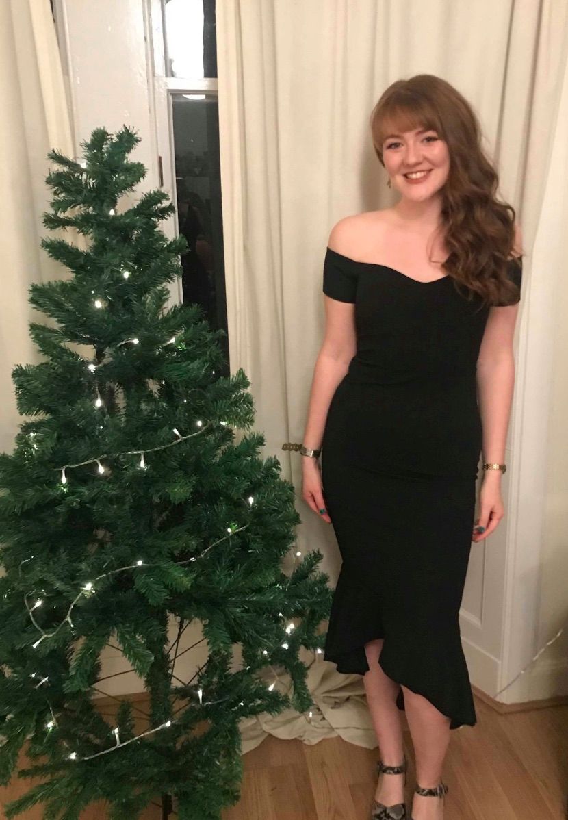Image may contain: Female, Fashion, Evening Dress, Robe, Gown, Dress, Clothing, Apparel, Christmas Tree, Tree, Plant, Ornament, Human, Person