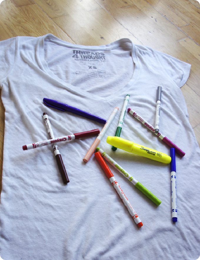 Think outside the lines and scribble over a white t-shirt with coloured pens.