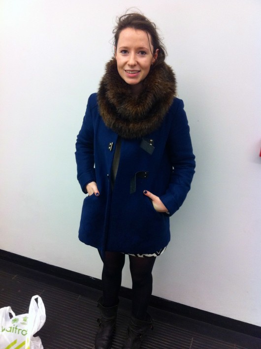 Kalina fights off the cold while looking fabulous in her faux-fur snood. 