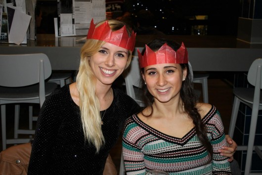 Two housemates getting into the Christmas spirit together