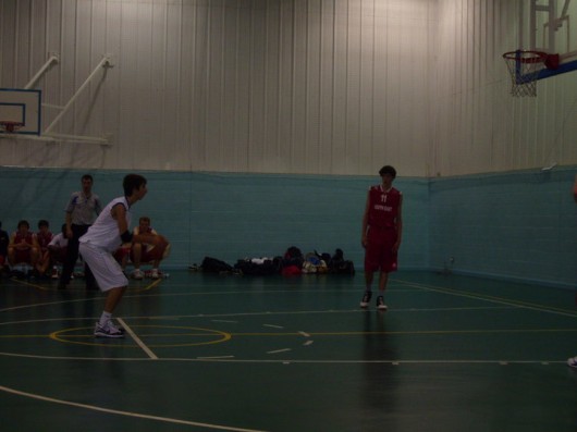 Theo in action for the Basketball team