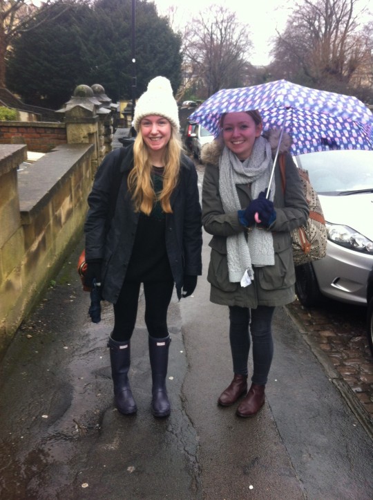 Lucy is indestructible against the elements, rocking a bobble hat, waxed jacket and wellies; Sophie fights off the dreariness with her vibrant printed umbrella (fingers crossed it lasts!).