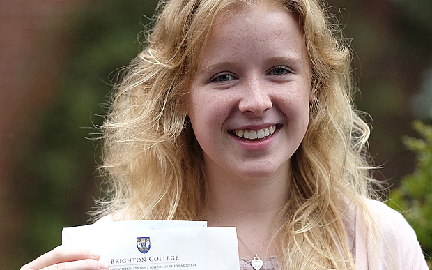 Hal0064369. Telegraph. Singer (Arundel Carthedral Chorister and BBC Songs of Praise) Amelia Craddock (AAB) celebrates as she collects her A Level results at Brighton College in Sussex Thursday August 13, 2015. Picture by Christopher Pledger.