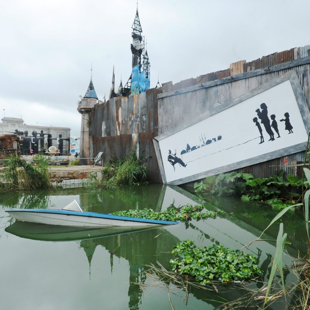Some of the weird and wonderful artworks on display at Banksy's 'Dismaland', August 20 2015. See SWNS story SWBANKSY; Banksy has confirmed he is opening the doors at a new pop-up exhibition - created at an old swimming centre he regularly used as a child. The graffiti artist's latest show, called 'Dismaland', is a sinister twist on  was revealed yesterday (Thur) One of the featured artworks by Josh Keyes.One of the featured artworks by Josh Keyes. Banksy said: ÃI loved the Tropicana as a kid, so getting to throw these doors open again is a real honour. ÃI hope everyone from Weston will take the opportunity to once more stand in a puddle of murky water eating cold chips to the sound of crying children.Ã