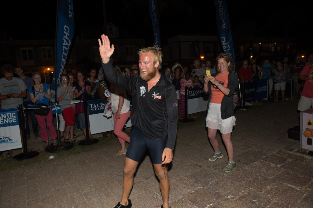Callum Gathercole celebrates at the finish line of the Talisker Whisky Atlantic Challenge CREDIT TED MARTIN