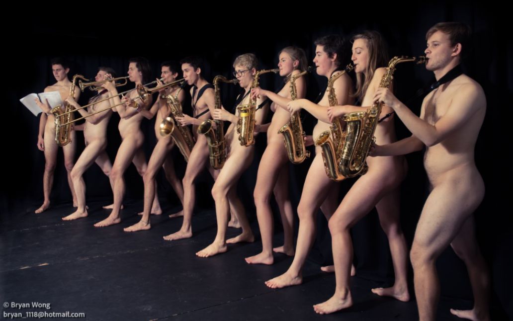 Image may contain: Swimwear, Clothing, Bikini, Saxophone, Musical Instrument, Music, Leisure Activities, Dance Pose, Dance, Person, People, Human