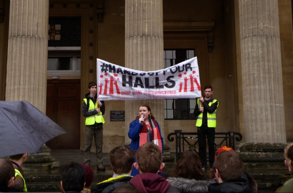 Image may contain: Performer, Crowd, Text, Banner, Person, People, Human