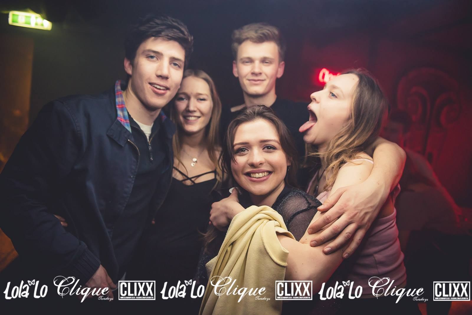 Image may contain: Night Life, Night Club, Club, Smile, Portrait, Face, Person, People, Human