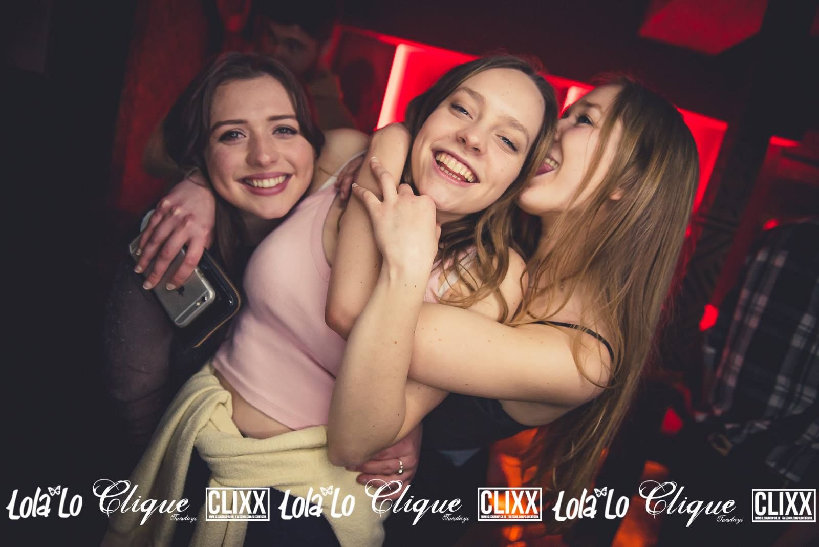 Image may contain: Smile, Portrait, Face, Night Life, Night Club, Club, Person, People, Human