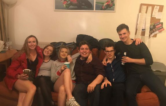 Image may contain: Party, Furniture, Couch, Person, People, Human
