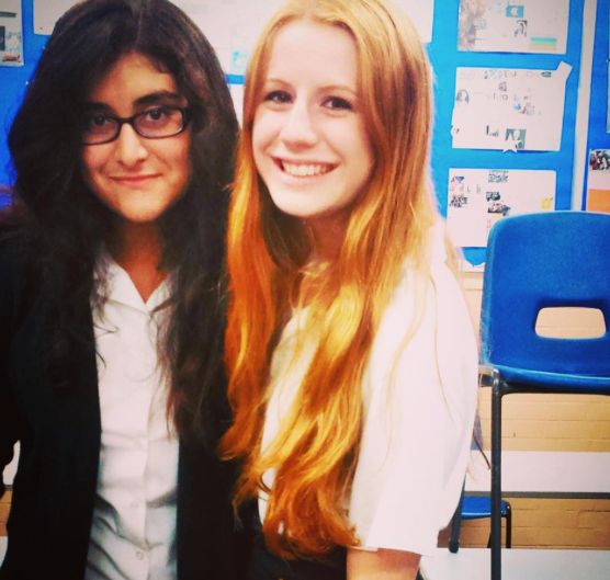 Image may contain: Photography, Photo, Portrait, Girl, Smile, Glasses, Accessories, Accessory, Female, Clothing, Apparel, Face, Human, Person, Chair, Furniture