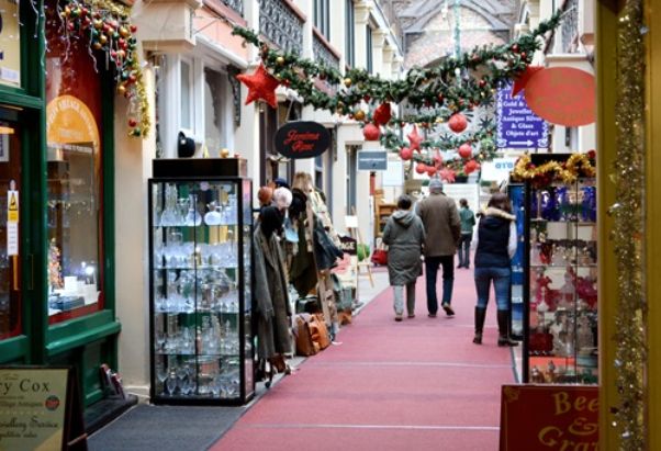 Image may contain: Shop, Market, Bazaar, Alleyway, Alley, Shopping, City, Building, Road, Town, Urban, Street, Human, Person