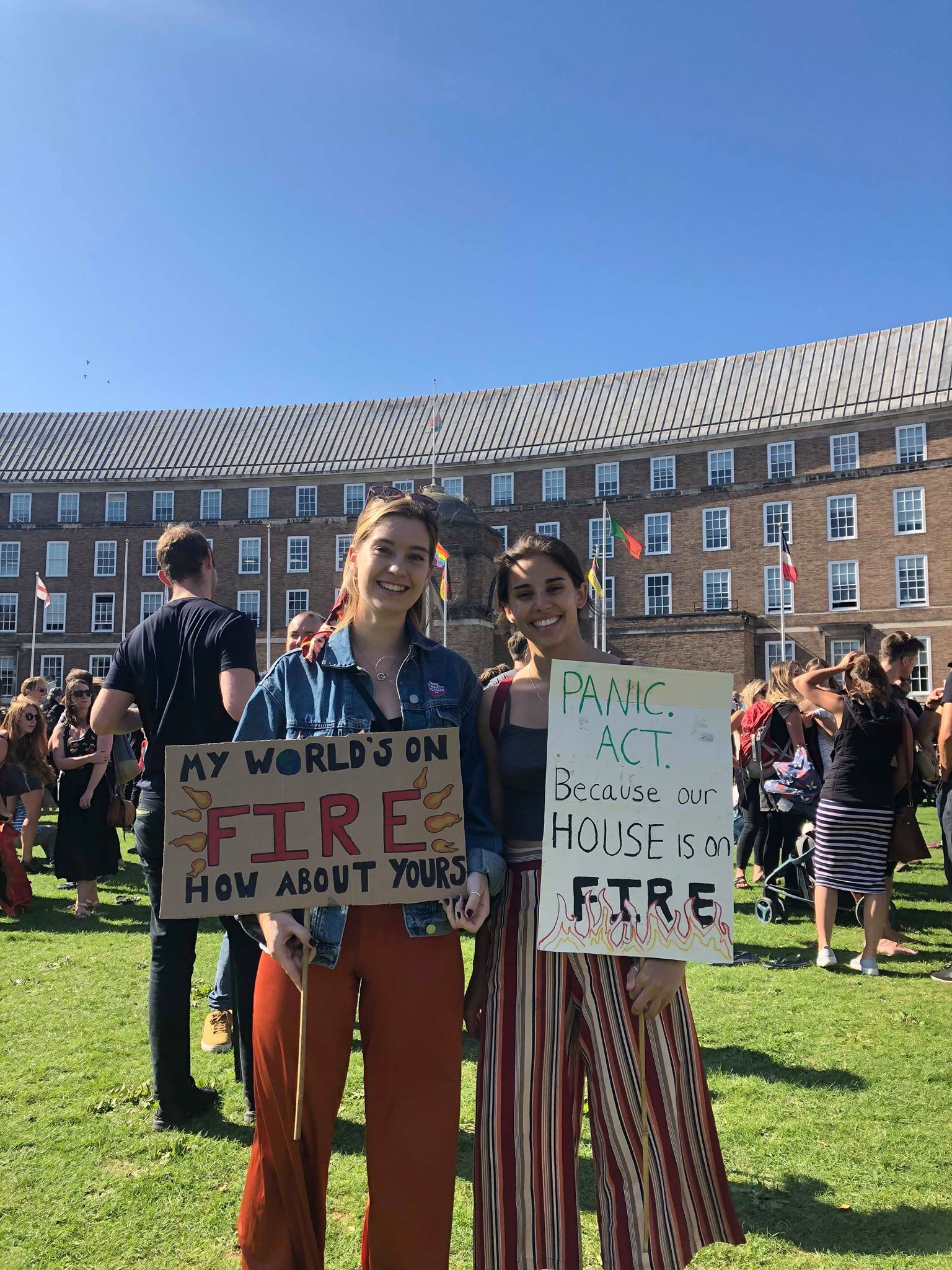 Image may contain: Plant, Banner, Festival, Text, Crowd, Human, Person