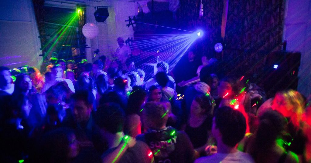 Image may contain: Disco, Party, Night Life, Night Club, Club, Lighting, Person, Human