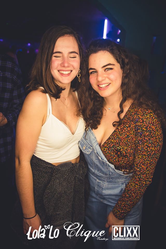 Image may contain: Female, Pants, Apparel, Clothing, Face, Night Life, Party, Night Club, Club, Human, Person