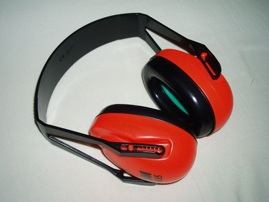 You may need a pair of these. Not to block out the sound of your flatmate, just to make sure you and your girlfriend don't deafen each other during sex!