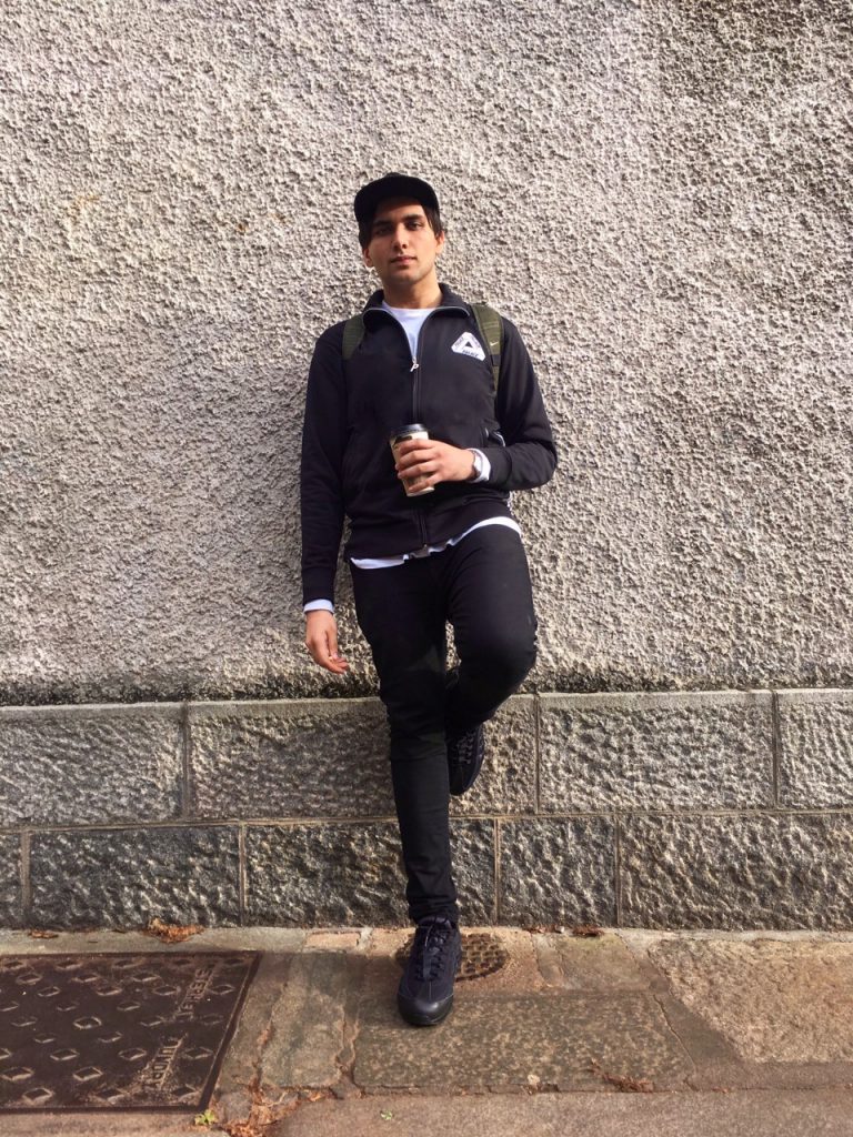 Ibby wears Palace x Adidas jacket, Fucking Awesome tee, Zara pants, Nike 95 trainers and backpack.