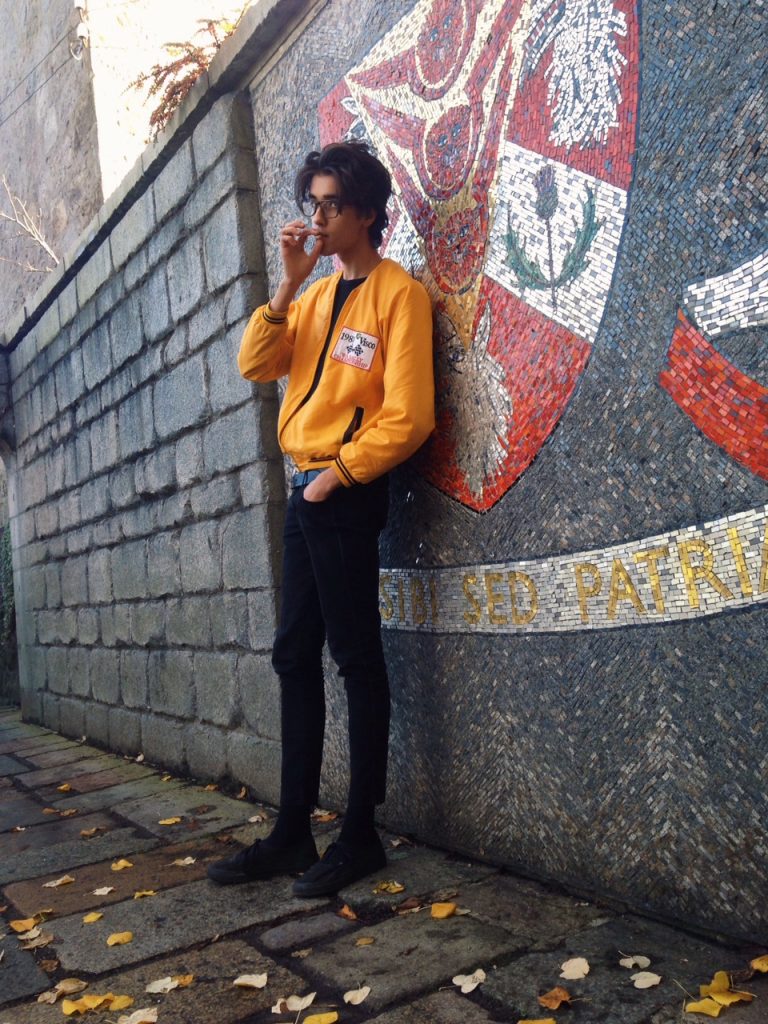 Karlis wears Elite Sporting Agencies Perth jacket, Vintage Sweater, H&M jeans, and Vans Old Skools