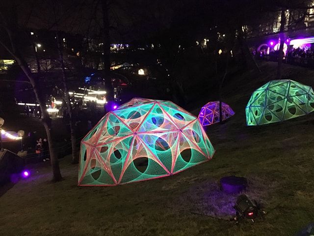 Image may contain: Vehicle, Transportation, Car, Automobile, Umbrella, Canopy, Night Life, Tent