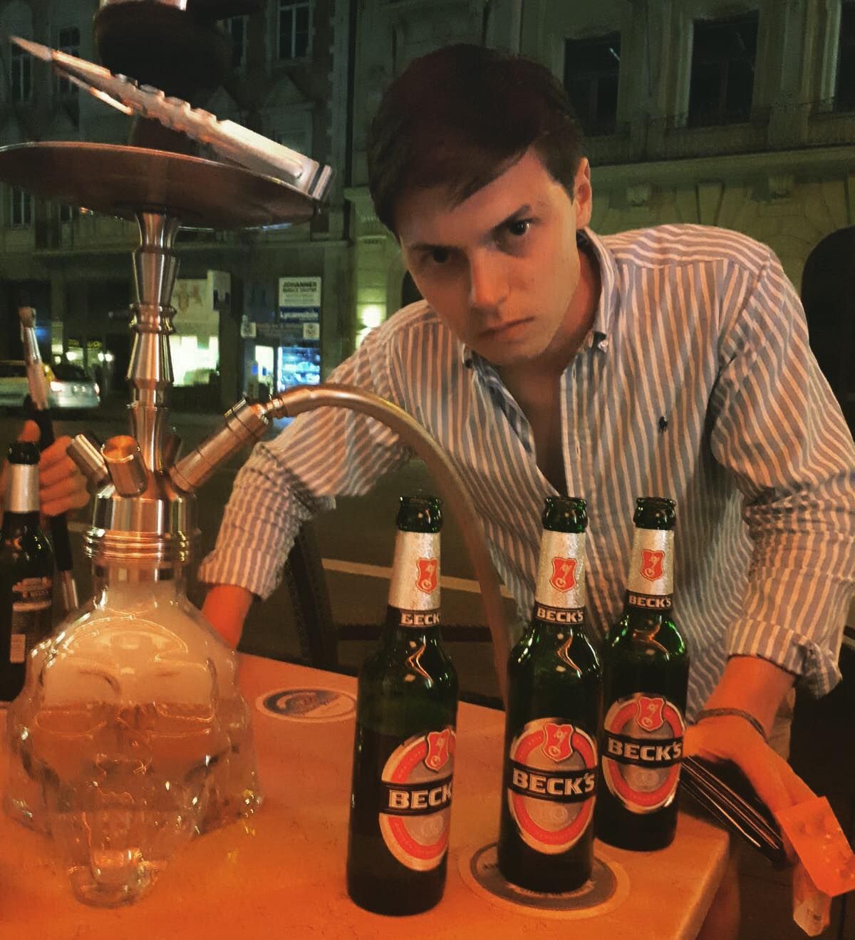 Image may contain: Bar Counter, Pub, Beer Bottle, Bottle, Beverage, Beer, Drink, Alcohol, Person, Human