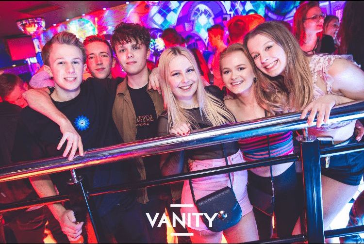 Image may contain: Photo, Portrait, Photography, People, Disco, Face, Night Life, Night Club, Party, Club, Person, Human