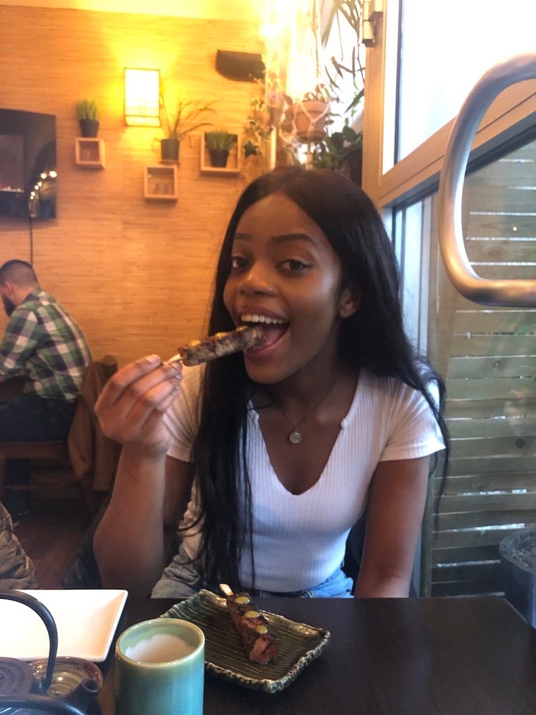 Image may contain: Dish, Eating, Meal, Food, Food Court, Person, Human, Restaurant