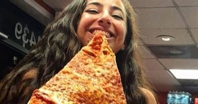 Image may contain: Face, Eating, Human, Person, Pizza, Food