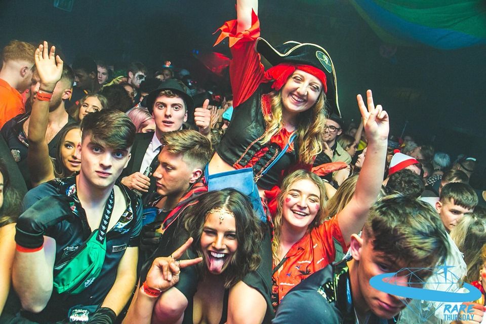 Image may contain: Club, Photography, Portrait, Photo, Female, Costume, Leisure Activities, Crowd, Night Life, Face, Party, Person, Human