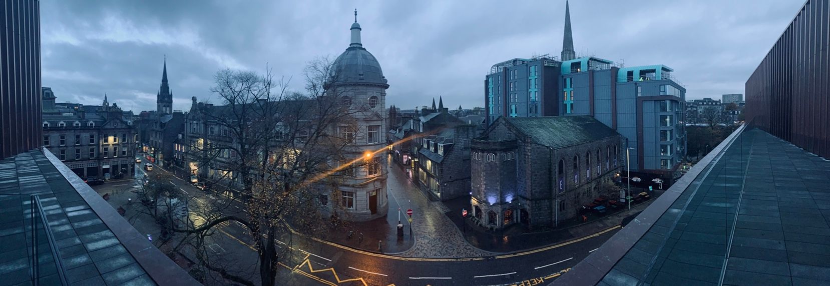 Image may contain: Downtown, Fisheye, Dome, Spire, Steeple, Tower, Architecture, Metropolis, Street, Urban, Road, Town, City, Building, Tarmac, Asphalt, Train, Vehicle, Transportation
