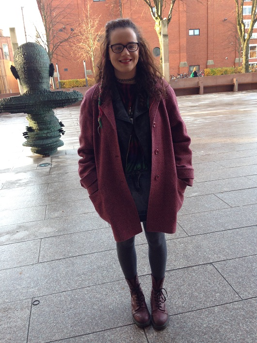 Law Student Hannah looks effortlessly chic and cosy in her Vintage coat from Yellow Submarine and matching Doc Martens