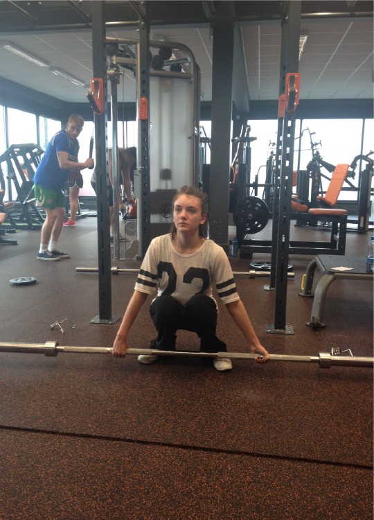 Trying to look like a boss lifting my measly weights