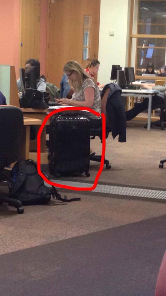 Some people are oblivious their image has been used. Some people shouldn't bring a suitcase to the library.