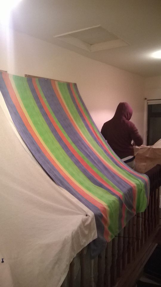 Mid-construction of the blanket fort (we should have been wearing hard hats)