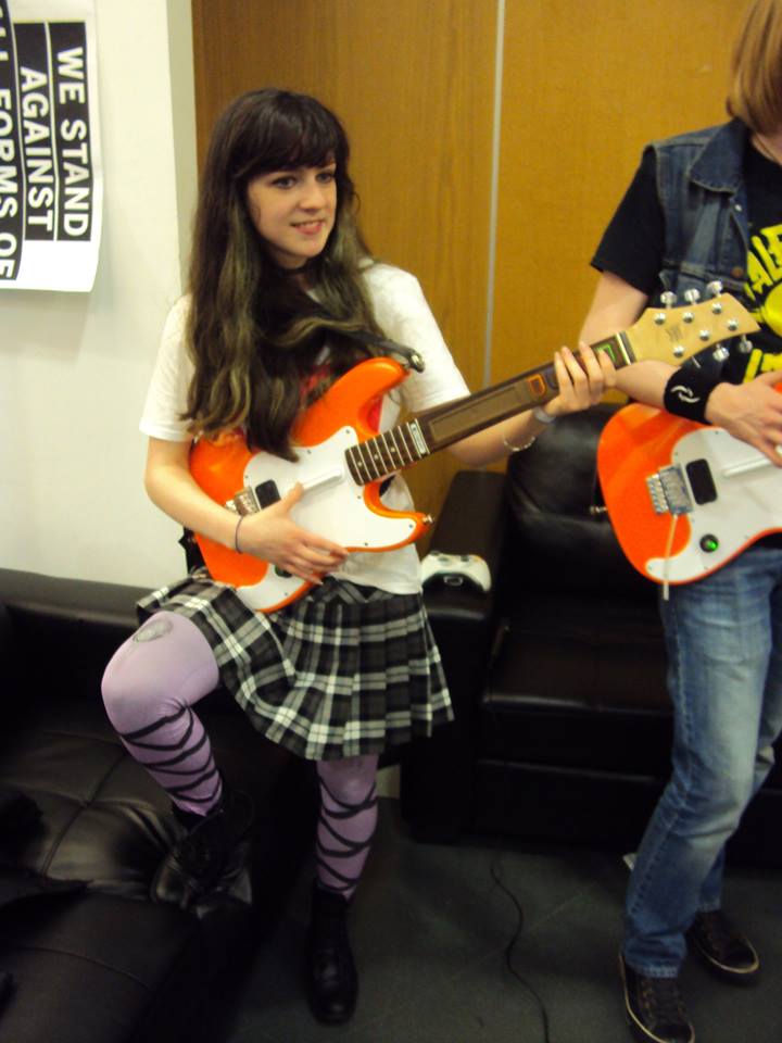 Looking slick on the guitar