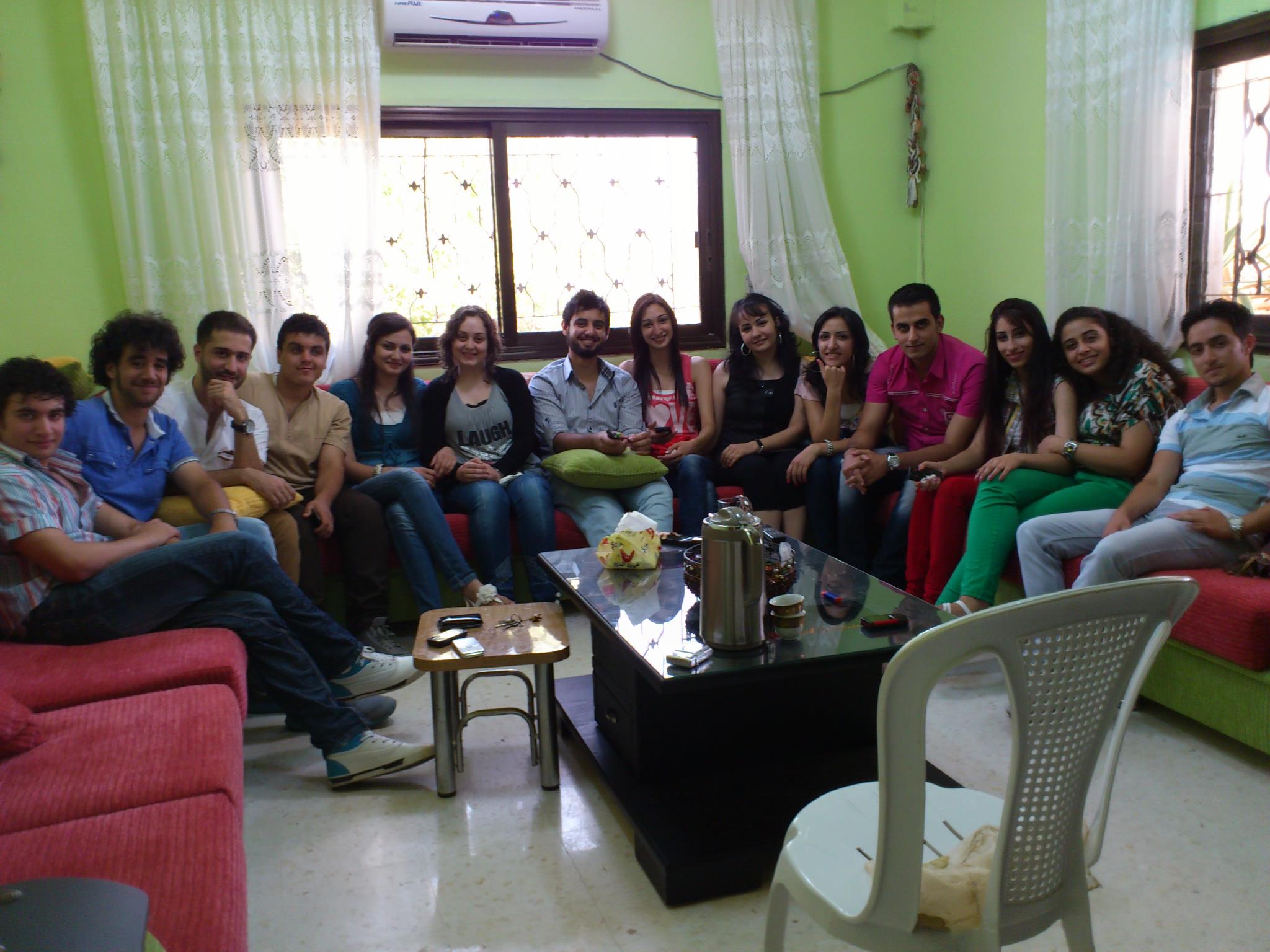Kais with family and friends in Syria