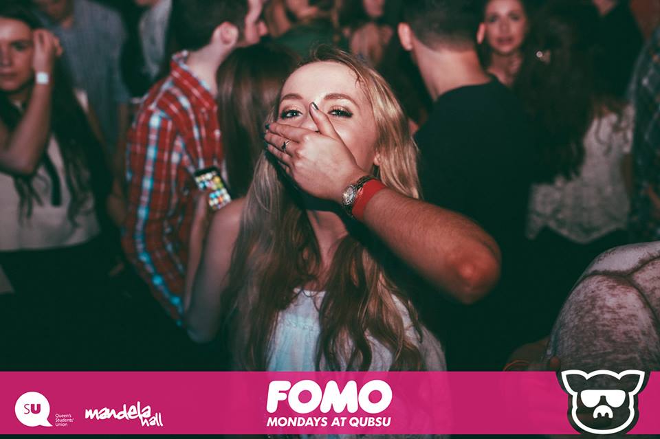 I don't know if she's holding down sick, or blowing a kiss...