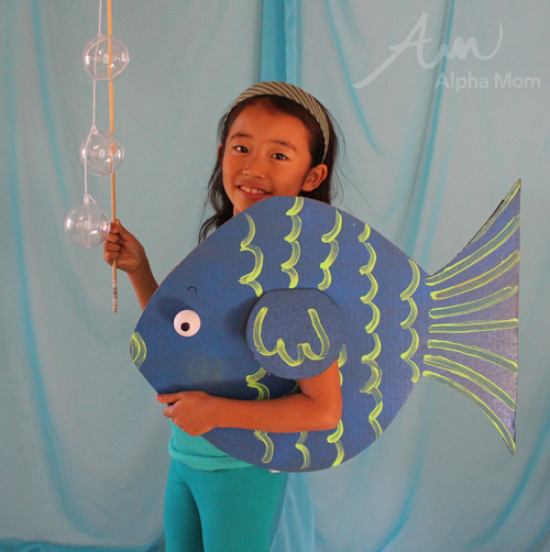 Option a). Simply replicate what this little girl has done only to the shape and scale pattern of the Big Fish
