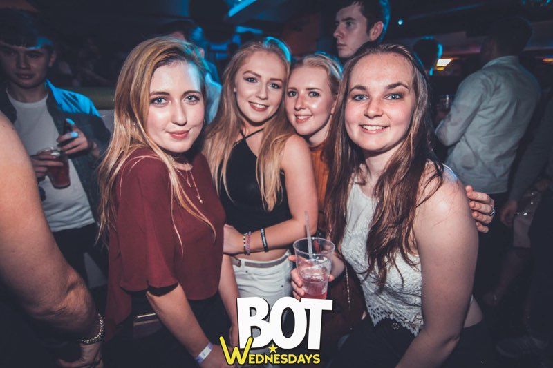 Image may contain: Party, Crowd, Cup, Glass, Festival, Club, Person, People, Human