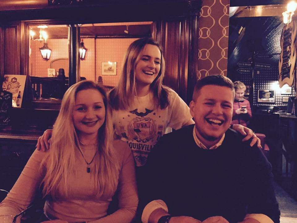 Image may contain: Smile, Portrait, Face, Woman, Female, Blonde, Pub, Bar Counter, Human, Person, People