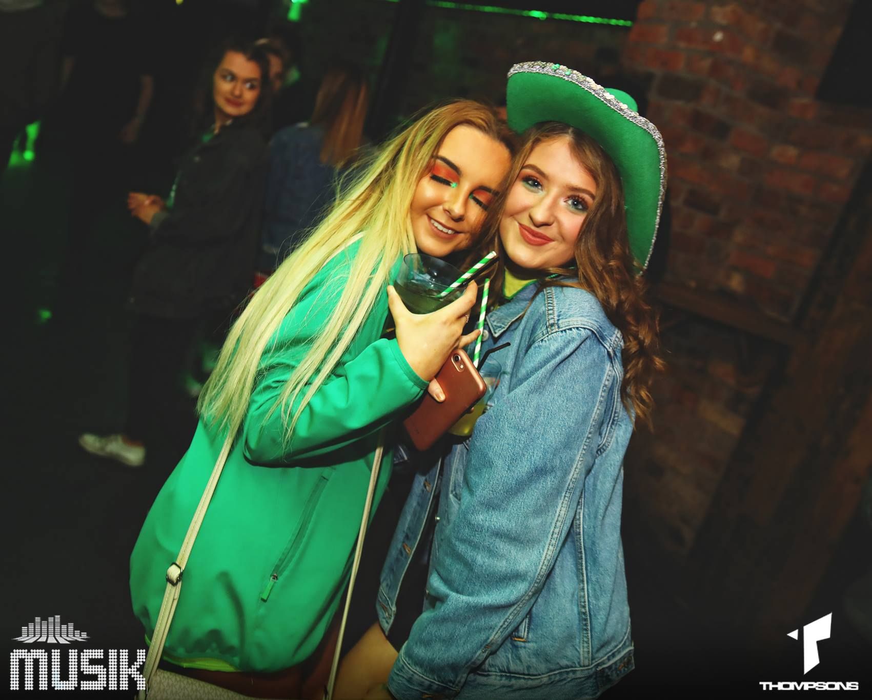 Image may contain: Party, Night Club, Club, Apparel, Hat, Clothing, Human, Person