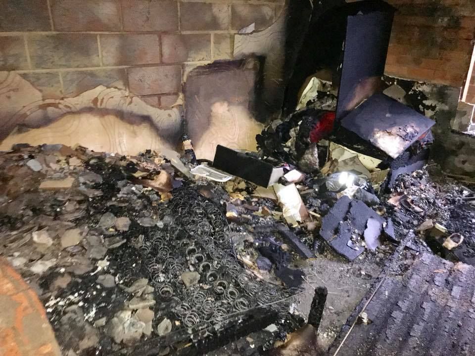 Image may contain: Rubble, Fireplace, Indoors, Hearth