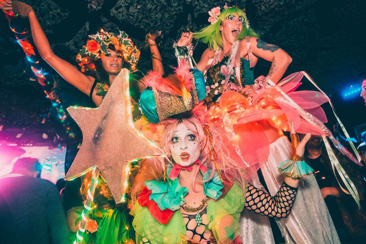 Image may contain: Skin, Dance Pose, Leisure Activities, Costume, Festival, Person, Human, Crowd