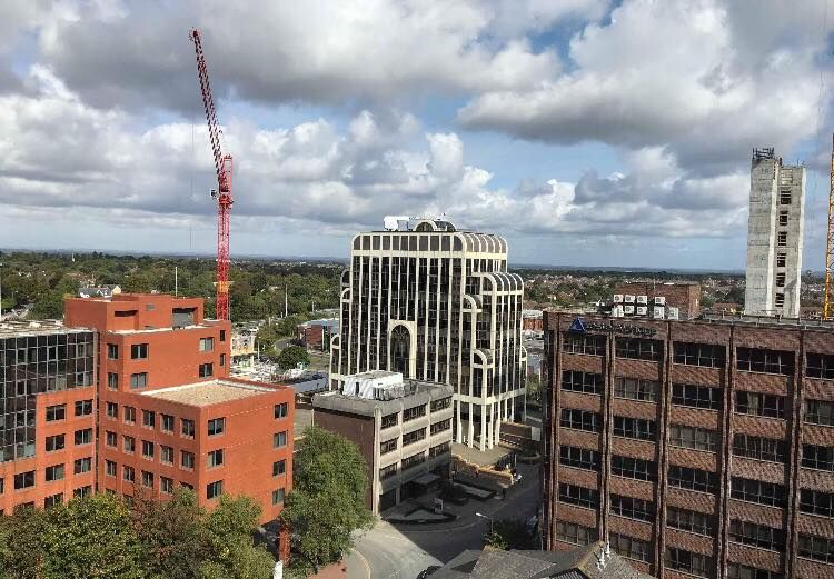 Image may contain: Housing, Condo, Neighborhood, Architecture, Construction Crane, Metropolis, Apartment Building, Office Building, Downtown, High Rise, Building, City, Urban, Town