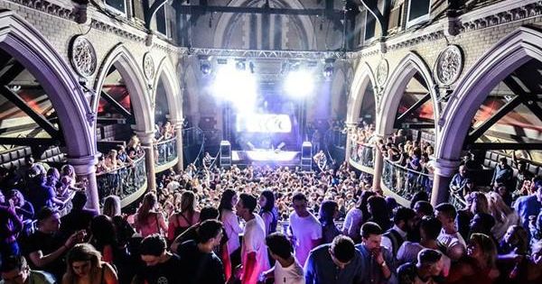 Image may contain: Leisure Activities, Night Club, Audience, Lighting, Club, Stage, Crowd, Night Life, Person, Human