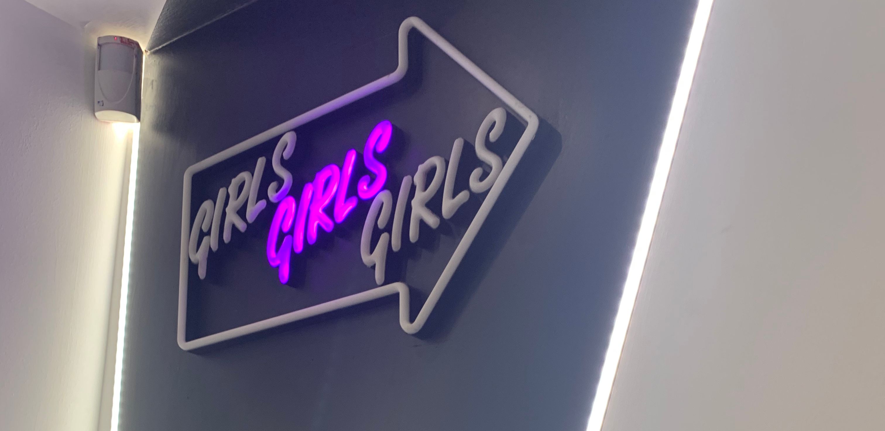 Image may contain: Symbol, Neon, Light