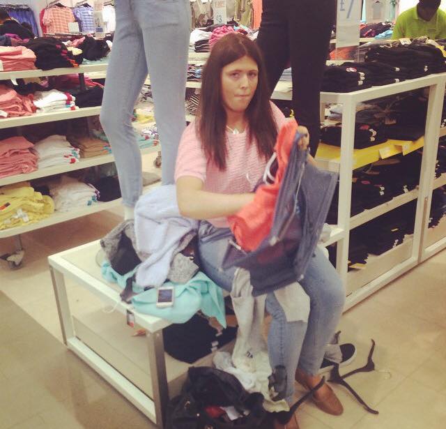 Sorting through the pile of goodies in Primark